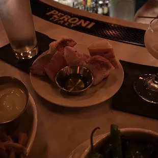 a plate of food and a glass of water