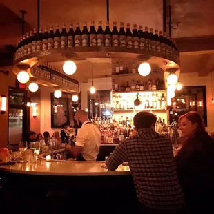 people sitting at a bar