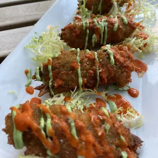 Fiore (ricotta stuffed &amp; fried zucchini flower, red pepper coulis, basil aioli)
