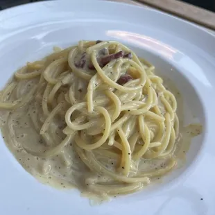 Duck Prosciutto Carbonara house-cured duck breast, buccatini, peppercorn, duck egg yolk, pecorino (w Spaghetti noodles)