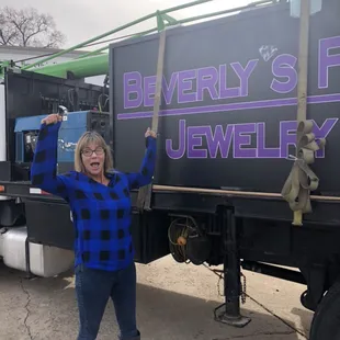 Store sign being delivered