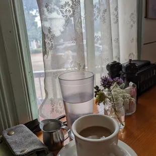 a cup of coffee on a table