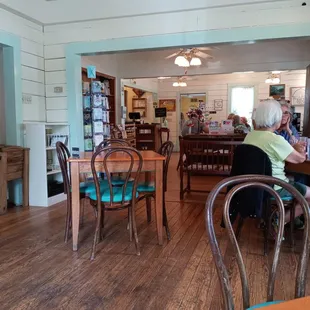 a woman sitting at a table