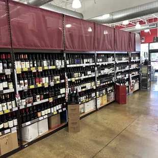 a wine store with shelves full of wine
