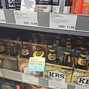 a display of beer in a grocery store