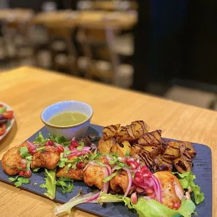 $29 Mtsvadi * Chicken | Medium-size meat cubes marinated in onions, herbs and spices. Grilled on skewers. Served with roasted potatoes.