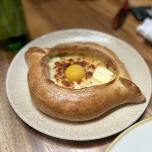 Cheese bread with raw egg and butter