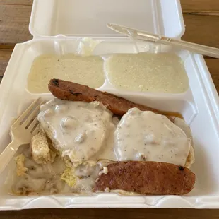 Sorry, I had to take a bite before the pic.  Scrambled eggs, biscuit, gravy, nettles sausage and grits.