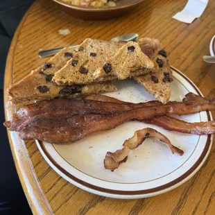 Skillet and raisin toast and bacon