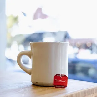 a cup of coffee on a table