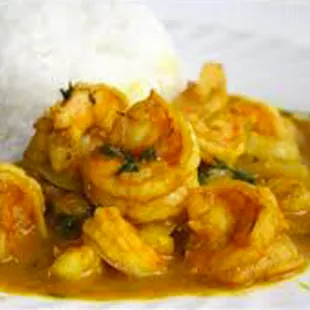 a plate of shrimp and rice