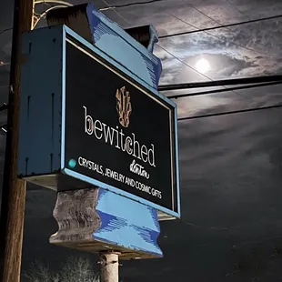 Our beautiful sign during the January Wolf Moon. Crystal shop in Denton.