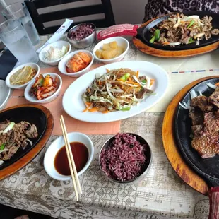 a table full of asian food