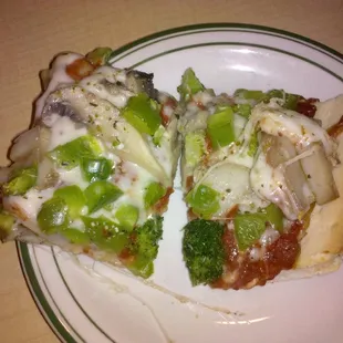 Slice of broccoli, mushroom, and green pepper pizza!