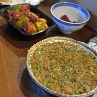 Gobi Manchurian and baingan bharta. Peas &amp; onions overwhelmed the eggplant mash.