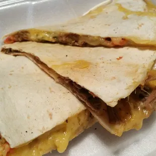 Succulent Beef Quesadilla, toasted to perfection with slow roasted beef and cheese. Winning dish.