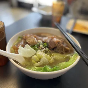 Cart Noodle (Beef Brisket, Beef Tendon, Pig Intestine and lettuce) in clear broth (braised broth was better)
