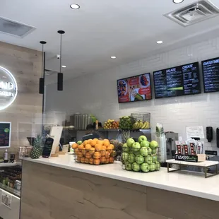 a counter with a variety of fruits