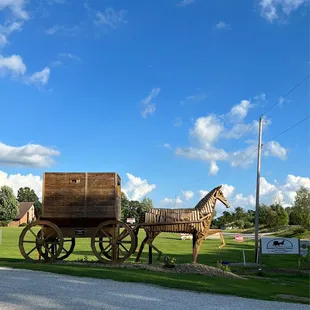 Wooden horse by the entrance to the parking lot