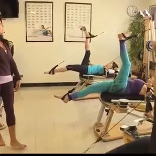 Teaching a group GYROTONIC Class.