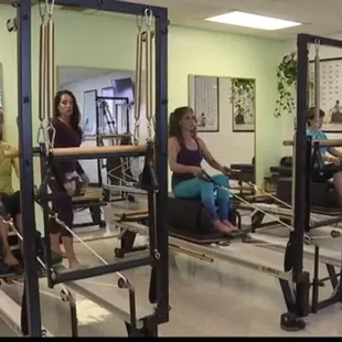 Teaching a group reformer class.