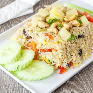 a plate of rice and vegetables