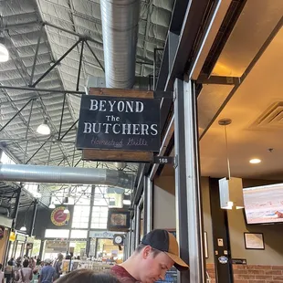 a man and a woman eating at a restaurant