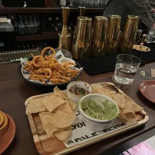 Curly fries, guac and chips