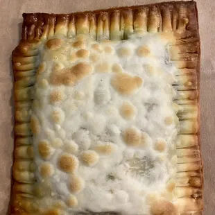 Pesto chicken pastel (empanada)