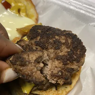 Over cooked slider that should be a medium double steakburger