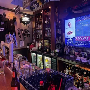 a bar with a large screen