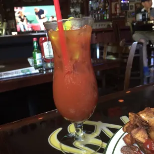 Nice dark bar with tons of TV's playing sports.