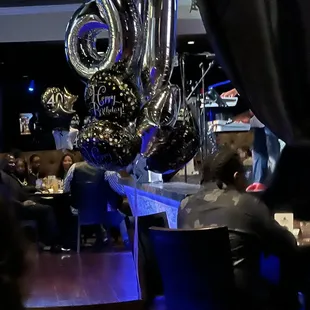 people sitting at a bar