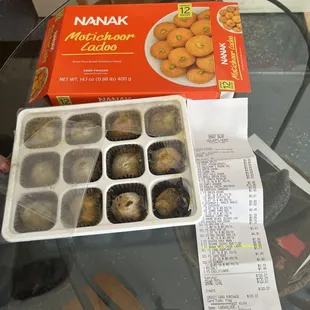 Box of ladoo sweets showing the receipt telling when was it bought