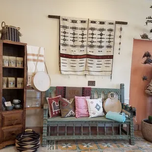 a living room with a couch and a rug