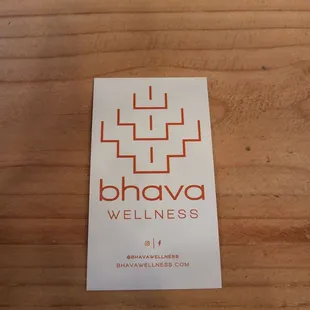 a business card on a table