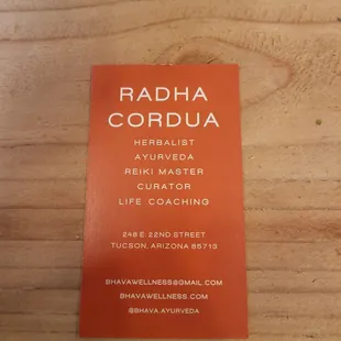 a business card on a table