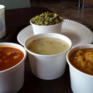For $14 you get a pretty hearty meal - chana masala, karhee, aloo gobhi, and gujarati khichri.. and its tasty and filling!