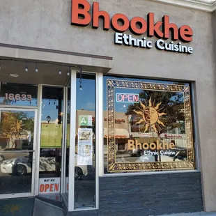 the front entrance of a restaurant