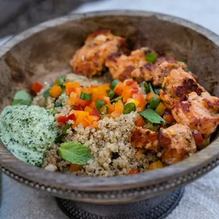 Quinoa bowl with salmon tikka