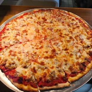 Sausage pizza cut in squares