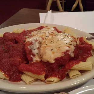 a plate of pasta and sauce