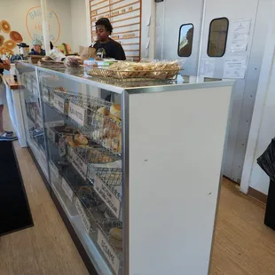 a woman behind the counter