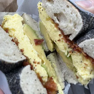 bacon egg avocado on poppy