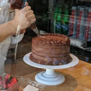 Frederico from Bianca Bakery putting in work for a colleagues surprise birthday.