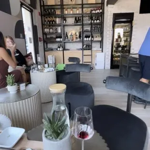 a glass of wine on a table