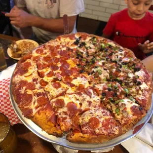 1/2 combo 1/2 pepperoni pizza that feed 9 adults and 4 children :)