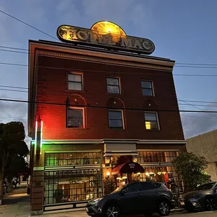 Hotel Mac illuminated at night
