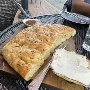 a piece of bread on a cutting board