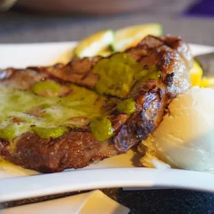 16oz rib eye steak with a sauce called Pele&apos;s Fire Cream sauce *7/6/23